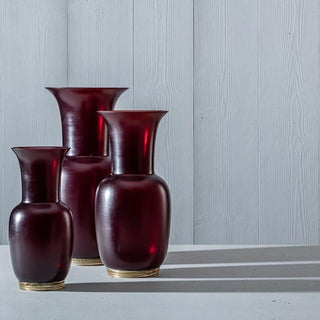 Venini Satin 706.38 satin vase ox blood red/crystal with gold leaf h. 30 cm. Buy now on Shopdecor